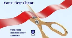 A pair of gold scissors cutting a red ribbon to signify opening a therapy practice