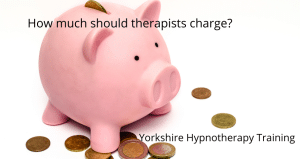 A piggy bank and coins to illustrate how much should therapists charge