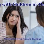 Working with Children in Therapy: Practical Guidance for Therapists a child confiding in a therapist