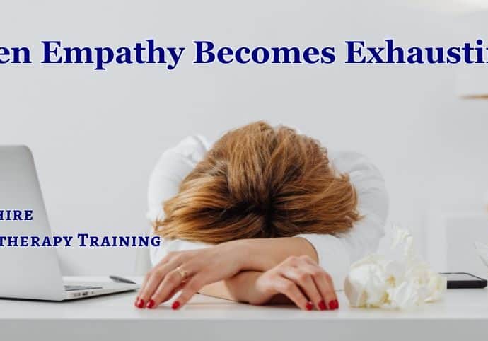 a therapist slumped across a desk, suffering compassion fatigue