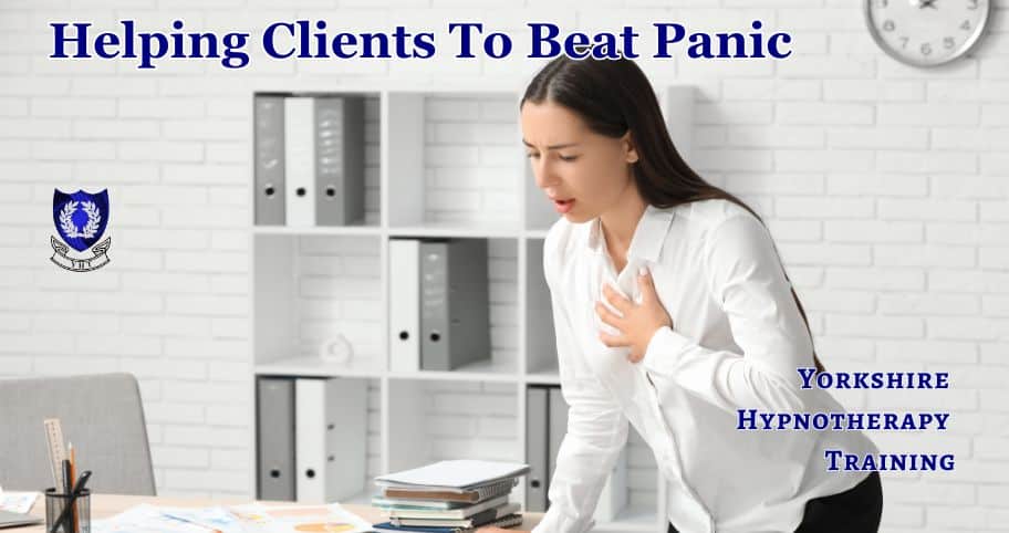 Help clients with panic attacks: a woman standing by a desk experiencing a panic attack