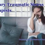 What Is Secondary Traumatic Stress? Signs, Risks and How to Manage It concept image, stressed woman on a sofa