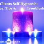 Teaching Clients Self-Hypnosis: Techniques, Tips and Troubleshooting lit candles on a soothing blue background to signify calmness and self hypnosis