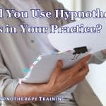 Should You Use Hypnotherapy Scripts in Your Practice? a woman reading a hypnotherapy script